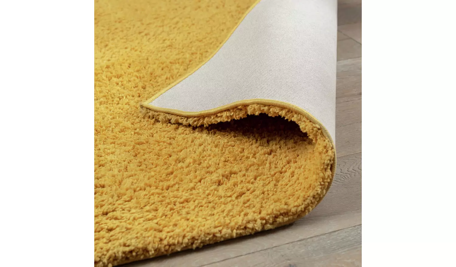 Habitat Cosy Mustard Shaggy Rug - 170x120cm