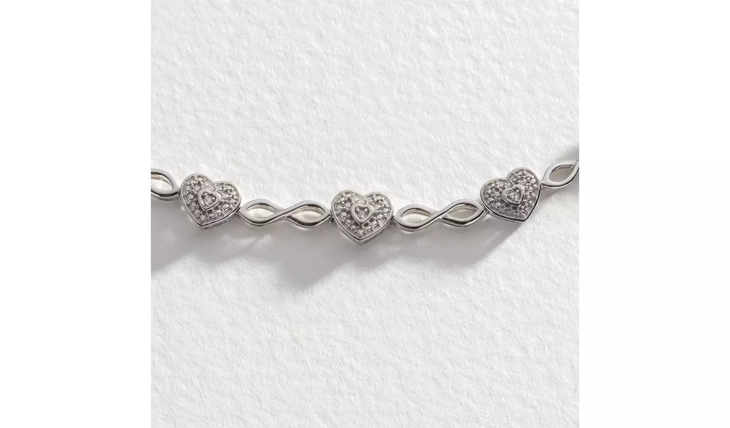 Revere Sterling Silver 0.05ct tw Diamond Heart Bracelet