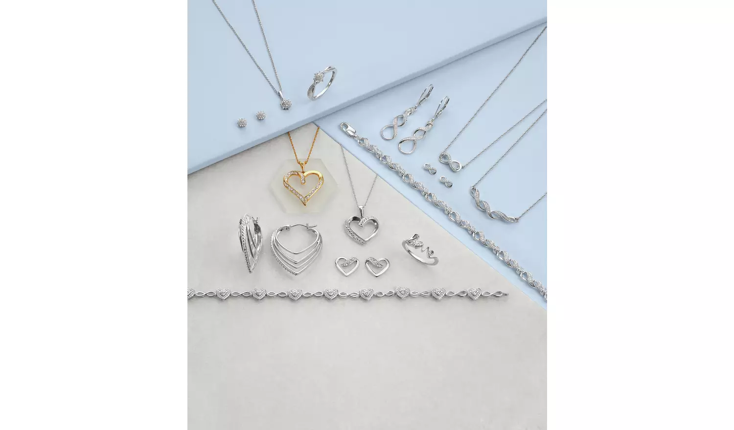 Revere Sterling Silver 0.02ct tw Diamond Infinity Studs